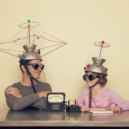 A father and his daughter communicate via a mind reading machine and telepathy to help understand one another. They are using a homemade invention to understand each others' minds.